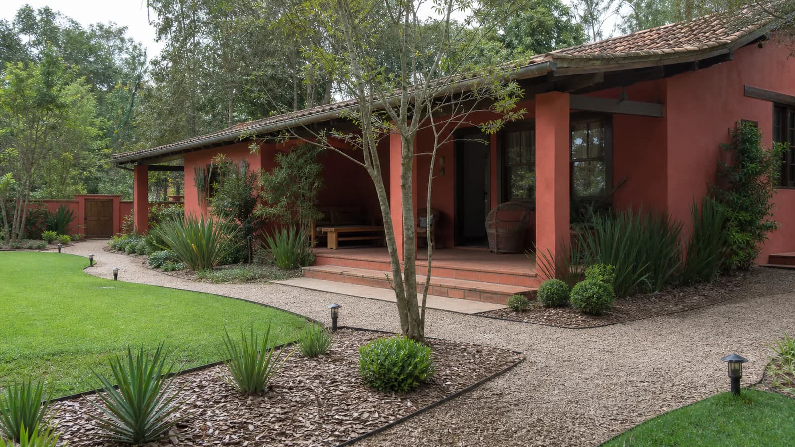 Jardim funcional de baixa manutenção em casa de temporada, em imagem editorial conceitual